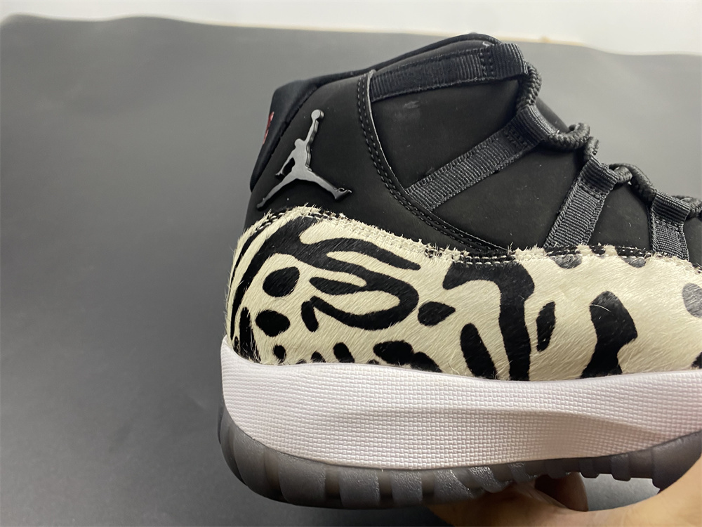 Air Jordan 11 “Animal Instinct” Black / Red / Sail / White